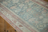 Distressed vintage Malayer runner: faded powder blue field, pale raspberry and ivory border.