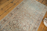 Distressed vintage Ahar runner with soft beige, brown, and powder blue curvilinear patterns.