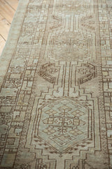 Repeating geometric medallions and pawn design motif on a distressed Serab runner.
