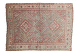 Distressed vintage Shiraz rug features faded teal, raspberry, ivory triple medallion design, 3'6