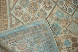 Hand-knotted foundation and distressed pile of a vintage Hamadan carpet, showing faded blue and beige medallions.