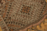 Intricate geometric patterns and braided fringe on the corner of a hand woven Jijim runner.