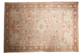 Distressed vintage Oushak rug with faded blush, ivory, and brown medallion design, 6'3