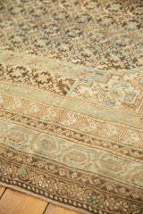Antique Caucasian carpet: Intricate geometric patterns with sky blue, ivory, and dusty gold abrash.
