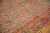 Distressed Khotan runner pile, with faded sea foam green, tangerine pomegranate, and wine red border.