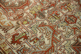 Distressed Mehrivan rug showing terracotta, dusty teal serrated leaf motifs on low pile.