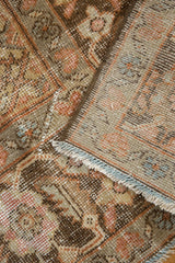 Distressed Mahal pile close-up, revealing isolated wear, visible knot heads, and pale blue fringe.