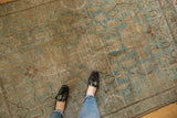 Distressed Hamadan rug with mostly even wear, seafoam green, and brown allover patterns.