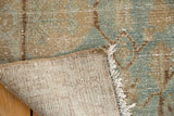 Hand-knotted foundation and distressed sea foam green and brown pile showing faint foundation.