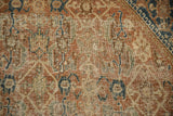Time-softened Herati motif with visible knot heads on an antique Persian Shiraz rug.