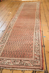 Vintage Mir Serbend rug corner, brick red mir boteh field, ivory border, and low pile texture.