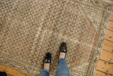 Distressed vintage Mir Serbend rug with faded allover boteh pattern and textured pile.