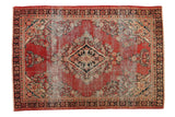 Faded cherry red vintage Mahal rug, navy diamond medallion, floral motifs, 4'3