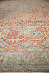 Worn pile texture of the distressed Mahal rug, showing soft red, blue willow and tree of life motifs.
