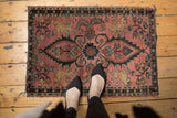 Antique Persian Lilihan mat with dusty raspberry field, navy medallion, Manticore. Early 20th century.