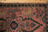 Antique Persian Lilihan rug detail: beige manticore, scrolling floral motifs, dusty raspberry field.