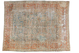 Distressed vintage Lilihan carpet with faded terra cotta border and dusty teal allover floral field, 8'11