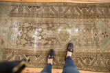 Distressed Hamadan runner, geometric patterns, sea foam green, and visible foundation wear.
