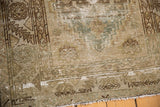 Distressed Hamadan runner's worn texture showing foundation and geometric pattern.
