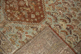 Hand-knotted Qashqai rug's secured side, woven foundation, and distressed rust-blue pile.