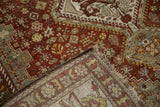 Distressed vintage Shiraz carpet, dark copper field, worn pile with faint foundation, and fringe.
