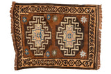 Vintage Oushak mat with a double geometric medallion design in chocolate brown, beige, and sky blue.