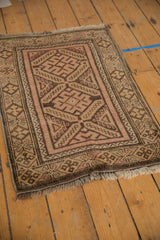 Vintage Belouch rug with chocolate, dusty blush geometric finned borders and fringe.