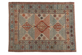 Distressed vintage Afghani rug mat, faded ivory, seafoam, and chestnut germinating tree medallions.