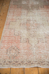 Distressed Oushak runner showing mostly even wear to foundation and knot heads.
