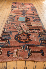 Geometric navy blue medallion and eclectic kilim patchwork on distressed Kars runner.