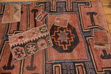 Distressed Kars rug runner with navy, blush, and orange geometric kilim patchwork.