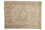 Distressed Karaja rug mat with triple geometric medallions in beige, silver, and green.
