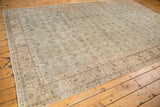 Distressed Turkish Sparta carpet, ocean green and beige, showing allover lattice and visible wear.