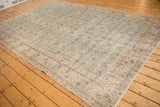 Corner detail of distressed vintage Sparta carpet, highlighting worn pile and visible foundation.