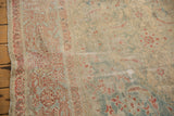 Worn pile and luminous patina on a traditional antique Sultanabad carpet, terra cotta floral border.