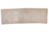 Distressed vintage Oushak runner, faint floral medallions, pale blush and ivory tones, 3'1