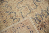 Corner of a distressed Sparta rug reveals its low-pile texture and neatly woven back foundation.