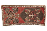 Distressed Oushak rug runner displays asymmetric octagonal medallions, foliage, dusty blush, and chocolate brown, 1'8