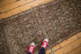 Textured distressed Malayer runner, highlighting faded allover Herati motif and variegated patina of muted colors.
