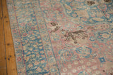Vintage Distressed Tabriz carpet with leopard and millefleur motifs in blush and ocean blue.
