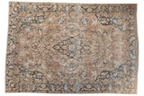 Vintage Baktiari carpet with oversized floral medallion, scrolling vines, faded ivory, teal tones, 7' x 10'1