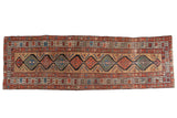 Antique Serab runner, linked medallions on a sand field, with red and blue accents, 3' x 9'5