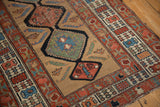Antique Serab runner featuring interconnected medallions, botehs, sand field, mallard green, wine red.
