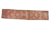 Antique Persian Mahal runner, intricate red, blue, and beige diamond medallions, 3'1