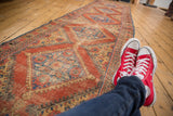 Mahal runner medallion: intricate serrated contours, madder root red, sky blue, and beige.