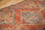 Antique Mahal runner detail: madder root red, sky blue serrated diamond motif, softened pile.