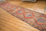 Antique hand-knotted Mahal runner with intricate madder red and sky blue diamond medallions.