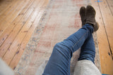 Vintage Distressed Sparta runner's soft, worn texture and faded blush, denim colors.