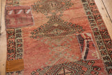 Fragmented kilim patchwork with hand stitching on the distressed blush Oushak runner.