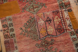 Kilim patchwork on a vintage distressed Oushak runner, with blush, gold, and vibrant patterns.